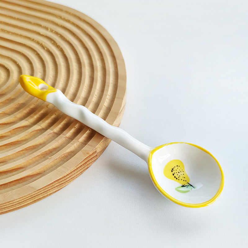 Ceramic soup spoon with lucky cat illustration and ergonomic long-handle Bowlift