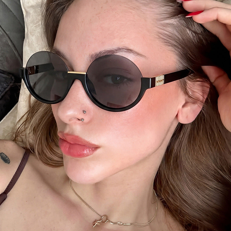 Women’s modern round sunglasses with elegant accents and UV protection Bowlift