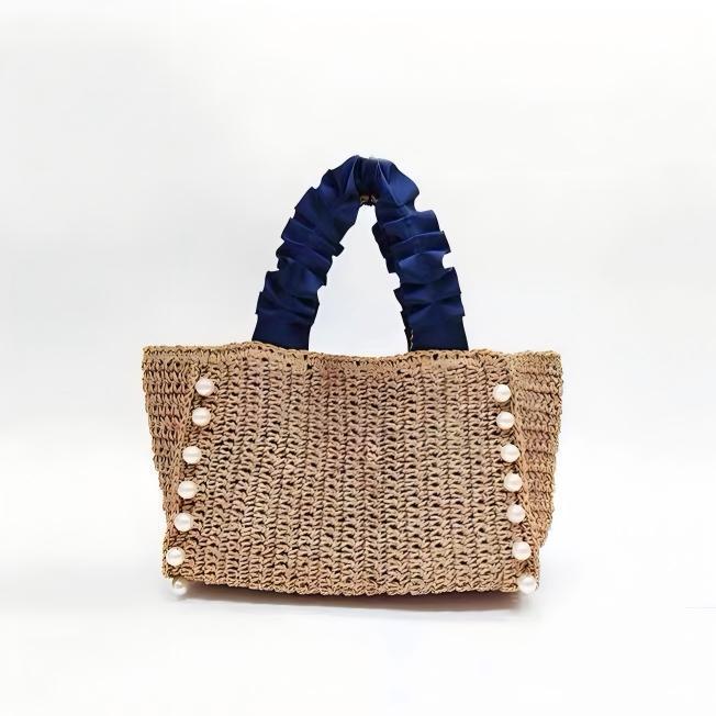 Fashionable straw bag with ruffle detail Bowlift