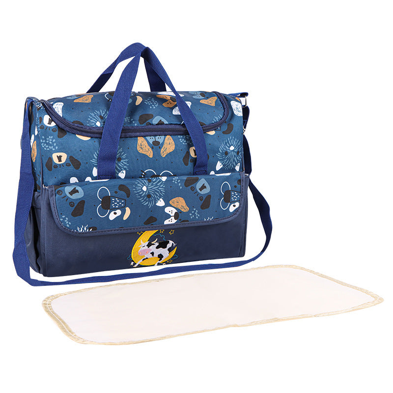 Multifunctional diaper bag with integrated changing mat Bowlift