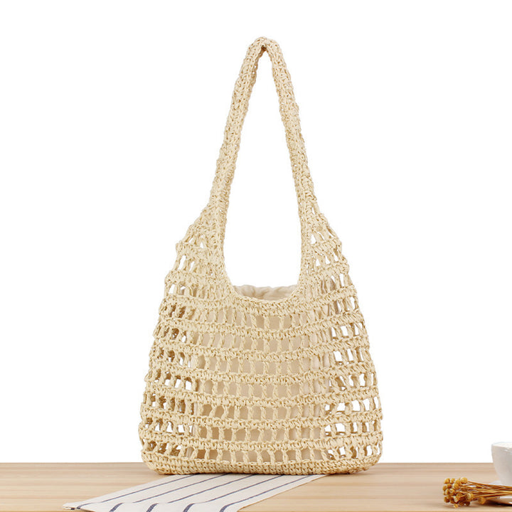 Handcrafted net shoulder bag with sturdy carrying handle Bowlift