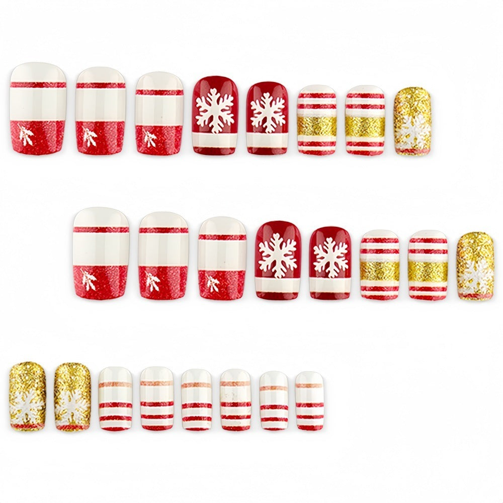 Artificial nails in festive Christmas design Bowlift