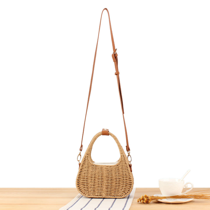 Shoulder bag made of woven natural material with elegant leather accent Bowlift