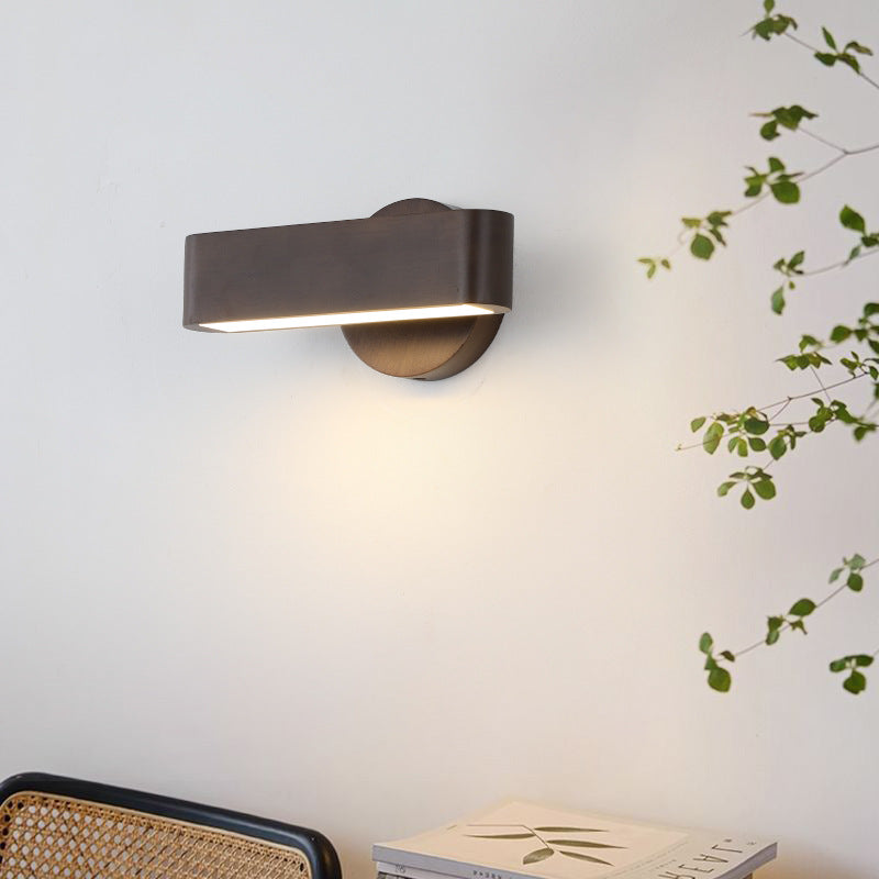 Compact bedside solid wood LED wall sconce with curved aluminum shade and frosted diffuser Bowlift