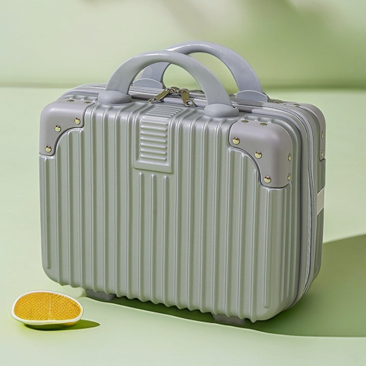 structured hard-shell vanity travel case with faux-leather corner reinforcements and dual top handles Bowlift