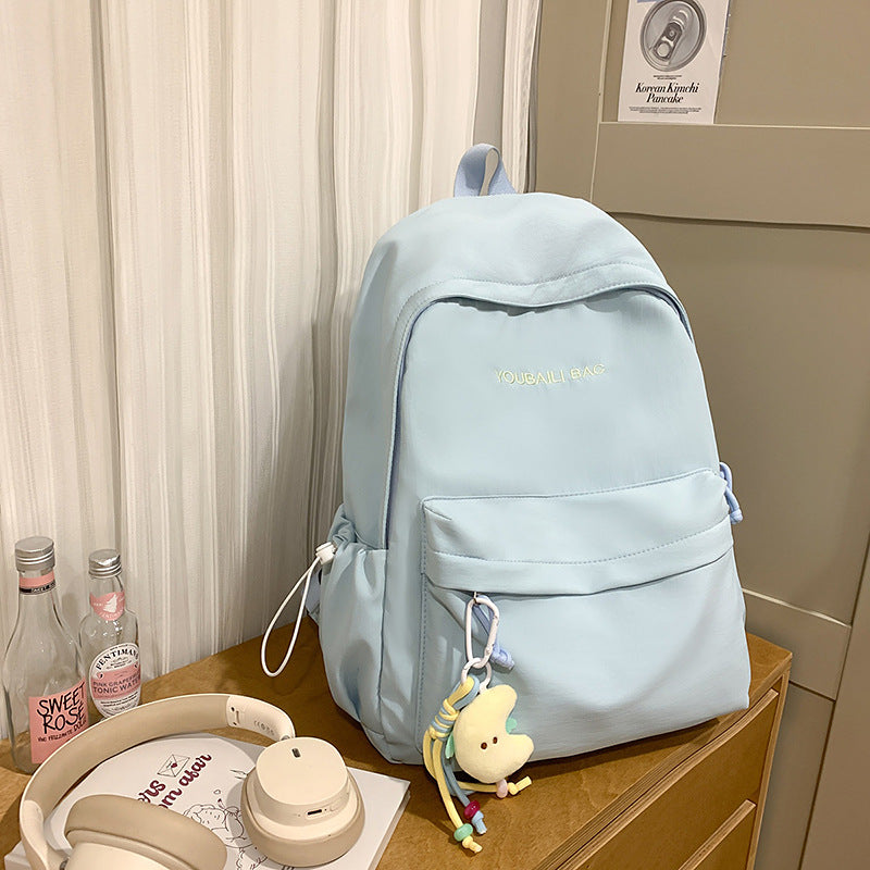 Lightweight Casual Backpack with Decorative Keychain Bowlift