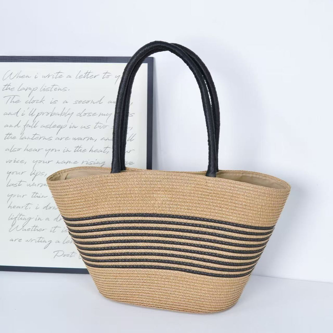 Beach bag with elegant stripe pattern and sturdy shoulder straps Bowlift