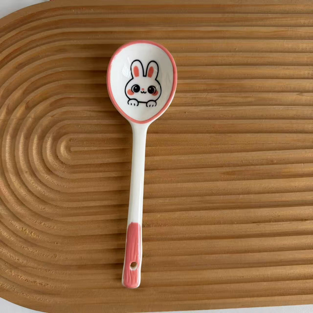 Ceramic soup spoon with lucky cat illustration and ergonomic long-handle Bowlift