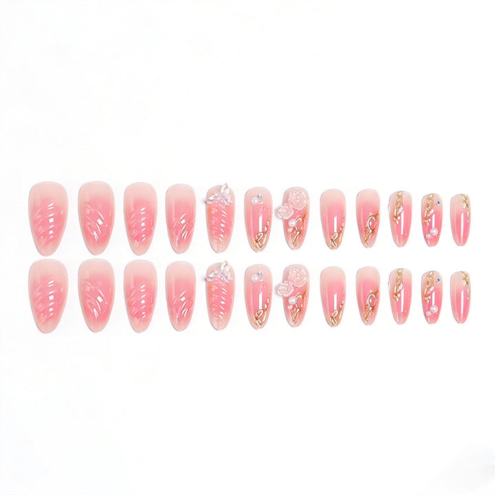 Artificial nail creation with floral 3D details and glitter accents Bowlift