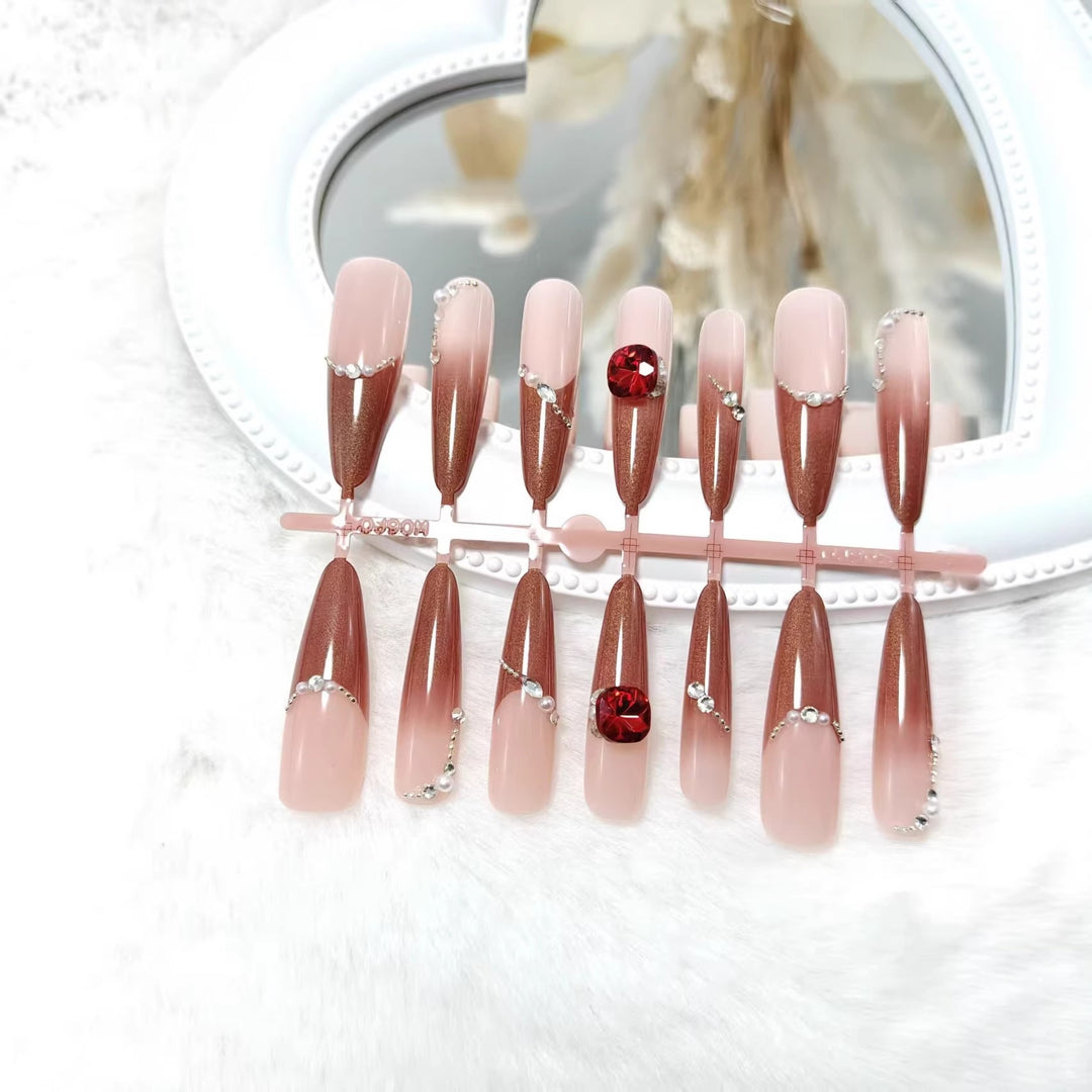 Artificial nails with luxurious 3D decorations and glamorous accents Bowlift