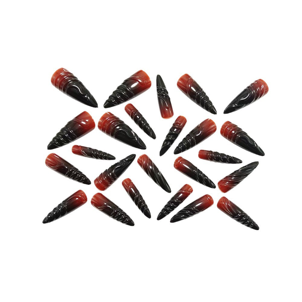 Gothic-style artificial nails with pointed tips and shiny surface Bowlift