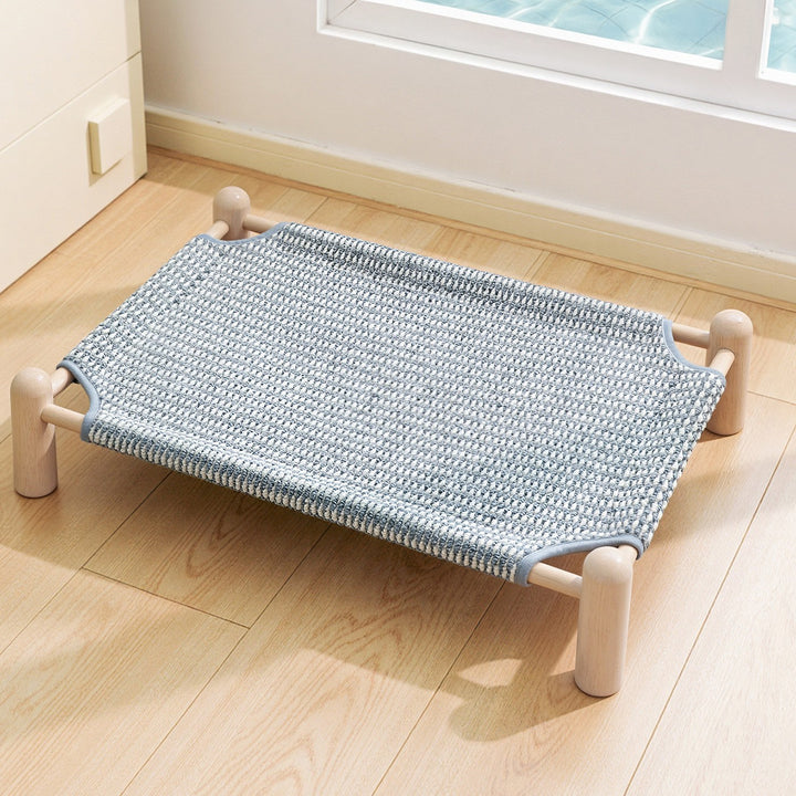 Unisex nan raised wooden pet bed with breathable, woven cover Bowlift