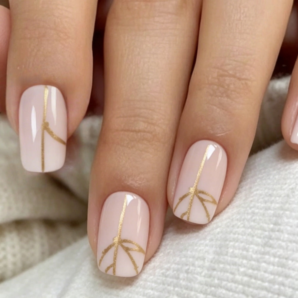 Artificial nails with elegant golden line pattern Bowlift