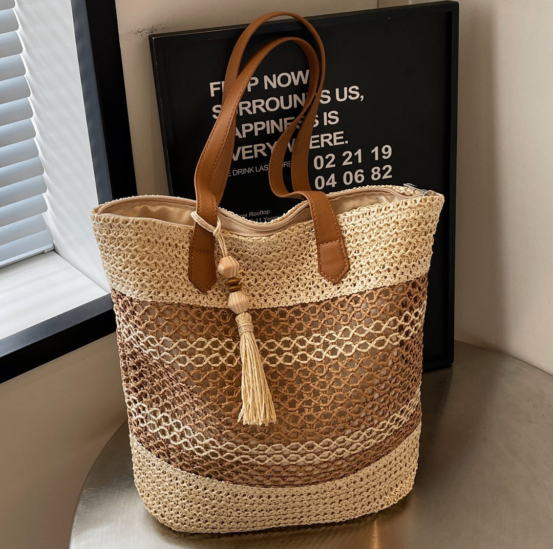 Fashionable straw tote bag with leather accents Bowlift