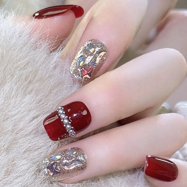 Glamorous artificial nail set with sparkling 3D applications and elegant embellishments Bowlift