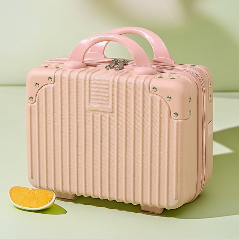 structured hard-shell vanity travel case with faux-leather corner reinforcements and dual top handles Bowlift