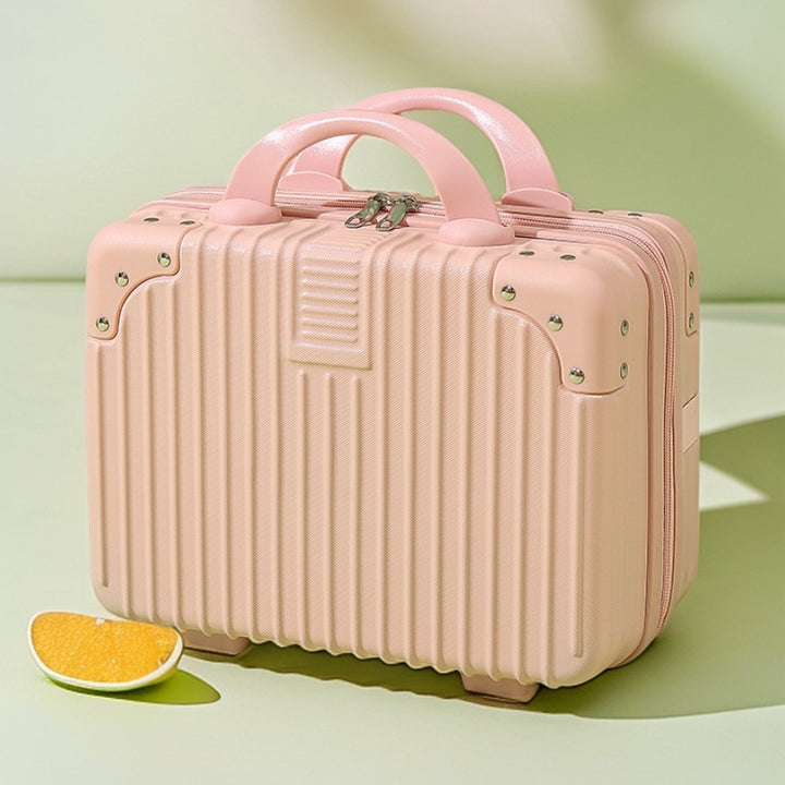 structured hard-shell vanity travel case with faux-leather corner reinforcements and dual top handles Bowlift