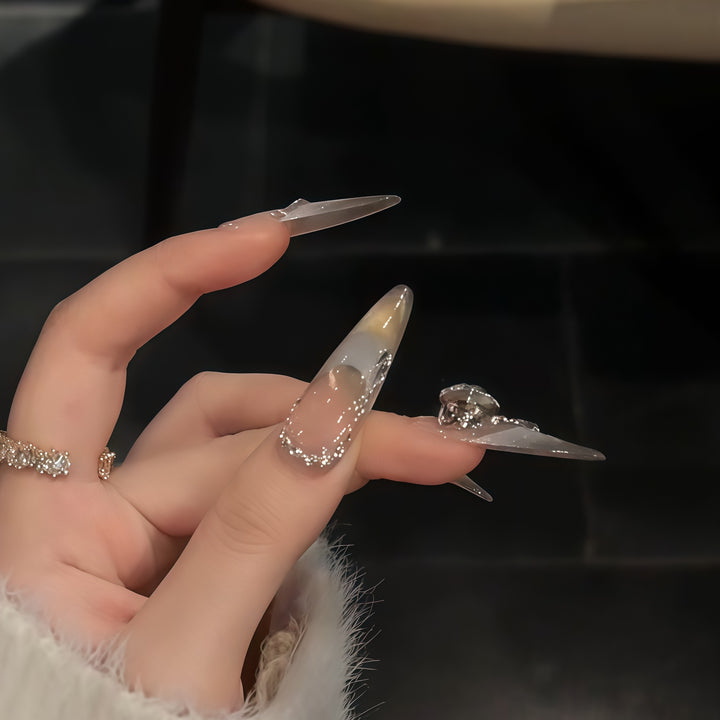 Artificial nails with elegant rhinestone accents Bowlift