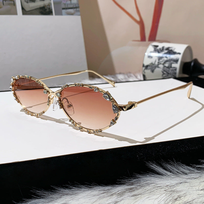 Women's exclusive sunglasses with sparkling rhinestone embellishment and elegant metal frame Bowlift