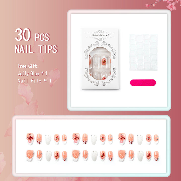 Artificial nails with handcrafted flower and glitter elements Bowlift