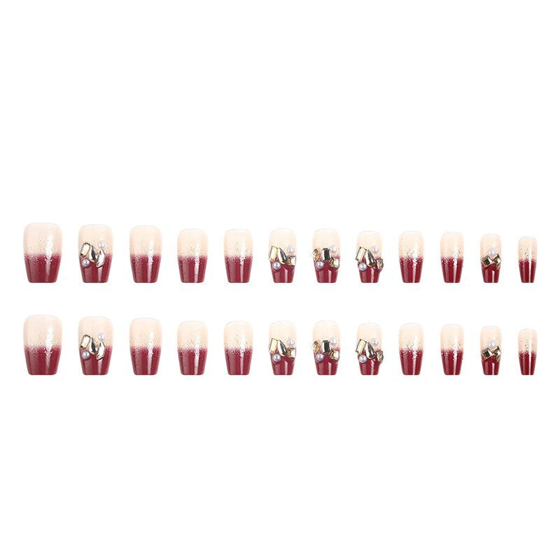 Acrylic nail set with elegant glitter and flower accents Bowlift