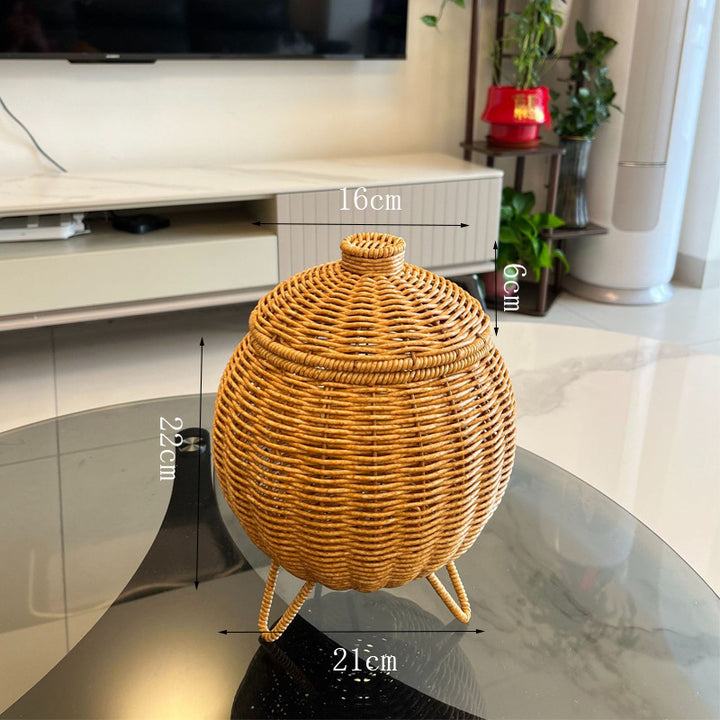 Women artfully woven storage pot Bowlift