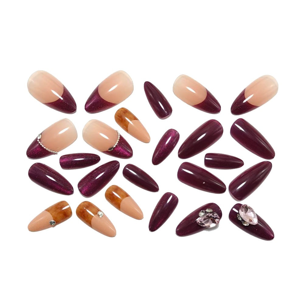 Artificial nails in elegant French design with glitter accents Bowlift