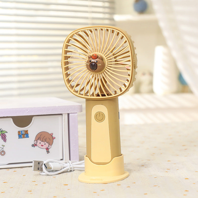 Unisex nan compact rechargeable handheld fan with stand and child-friendly bear motif Bowlift