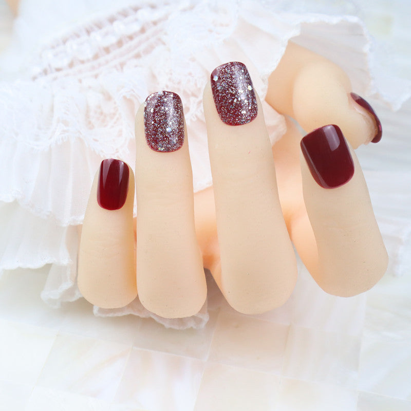 Glossy Press-On Nail Set with Glitter Accents Bowlift