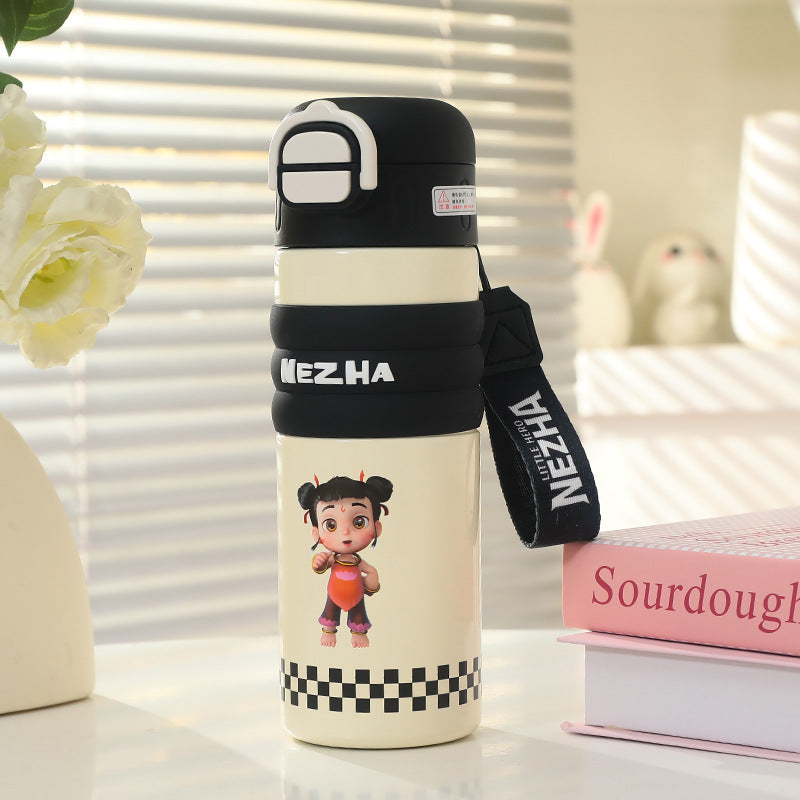 Insulated drinking bottle with a cute character design and practical carrying strap Bowlift