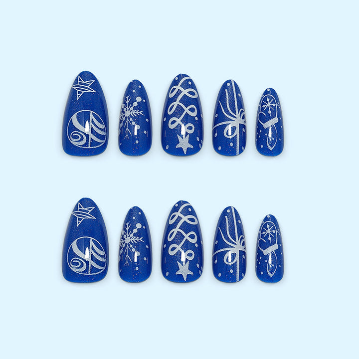 Artificial nails in festive winter design with glittering snowflakes and elegant decorations Bowlift