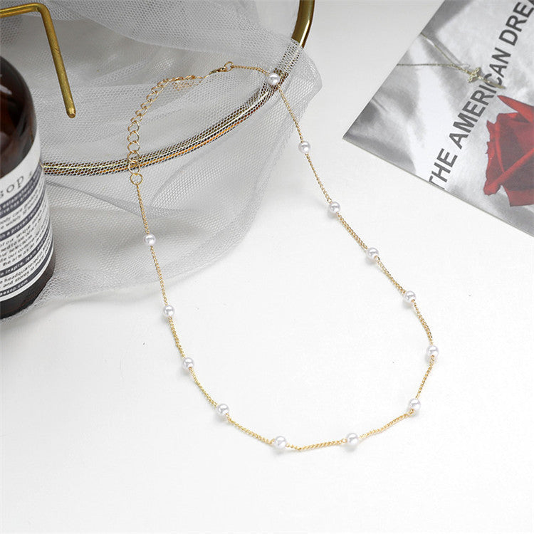 Delicate Pearl Accented Chain Necklace Bowlift
