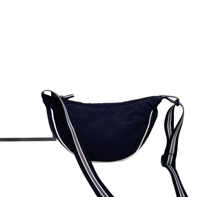 Fashionable shoulder bag with unique cut and adjustable strap Bowlift