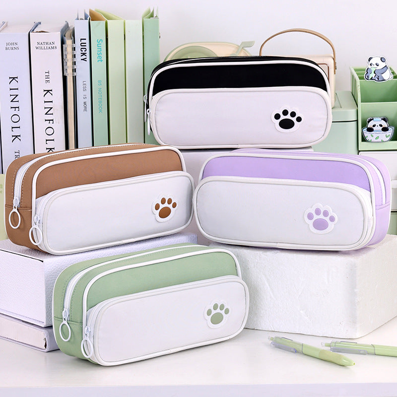 Pencil case with double compartment design and playful paw print motif Bowlift