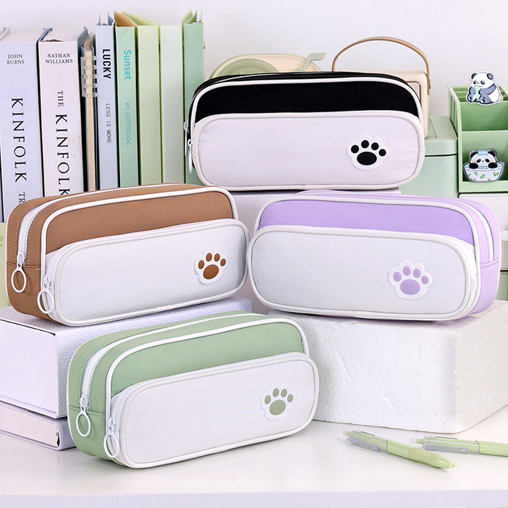 Pencil case with double compartment design and playful paw print motif Bowlift