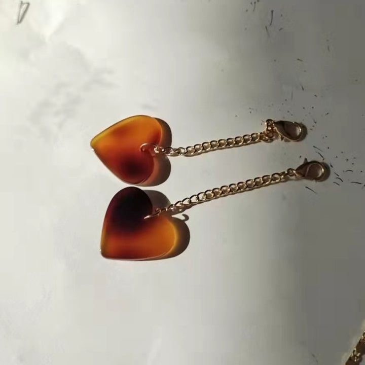 Heart-Shaped Dangle Earrings with Golden Chain Bowlift