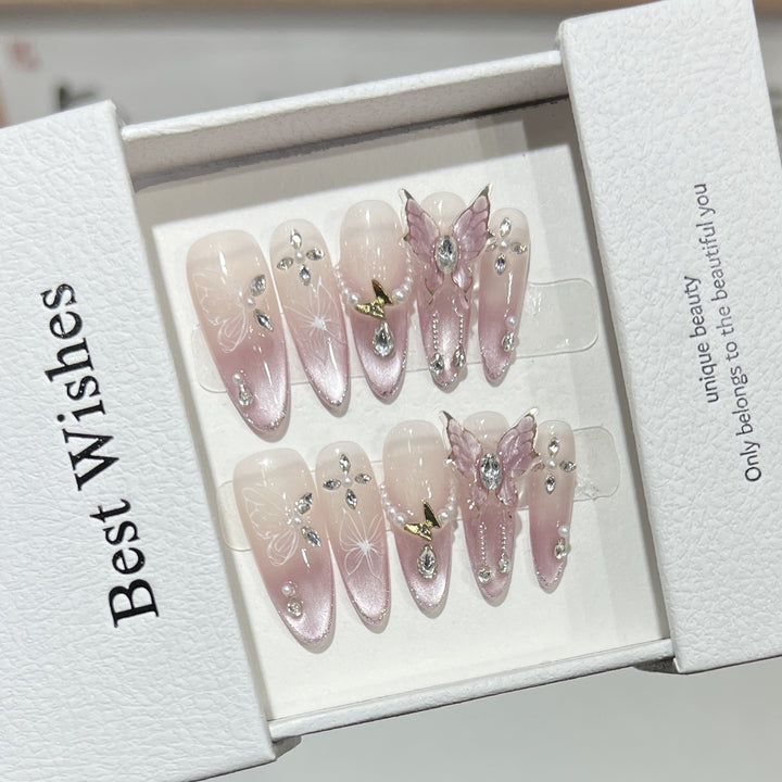 Artistic Stiletto Press-On Nail Design Set with Butterfly and Gemstone Accents Bowlift