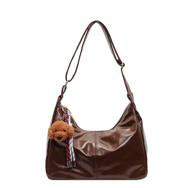 Shoulder bag with charming animal pendant Bowlift