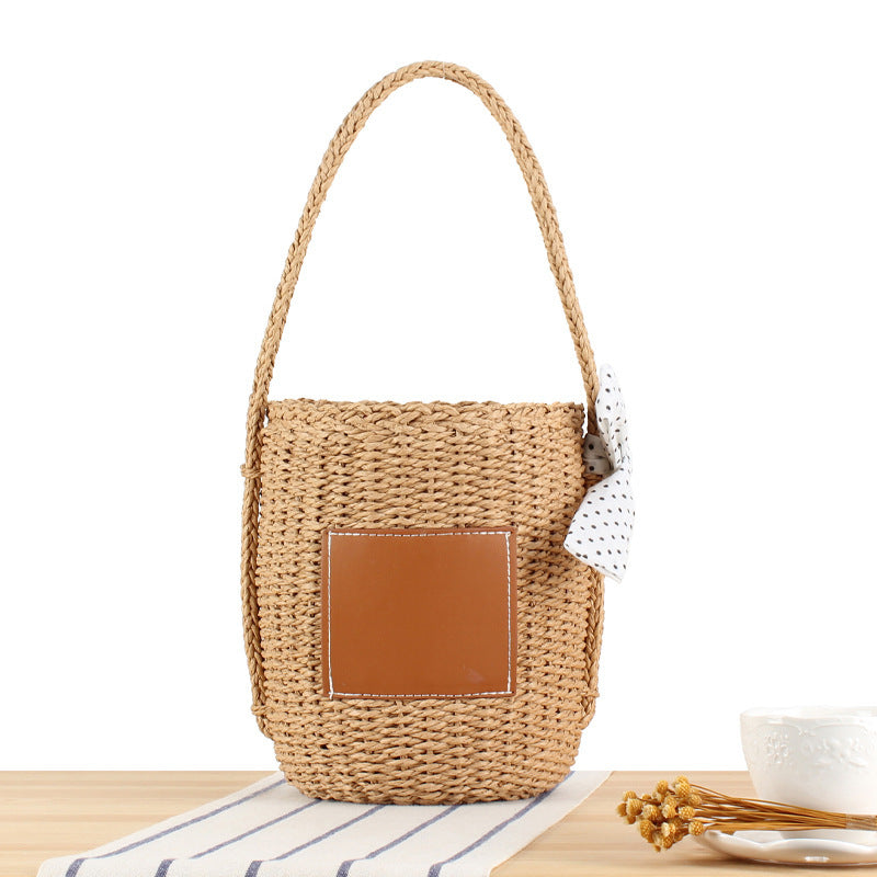 Braided tote bag with decorative leather accent Bowlift