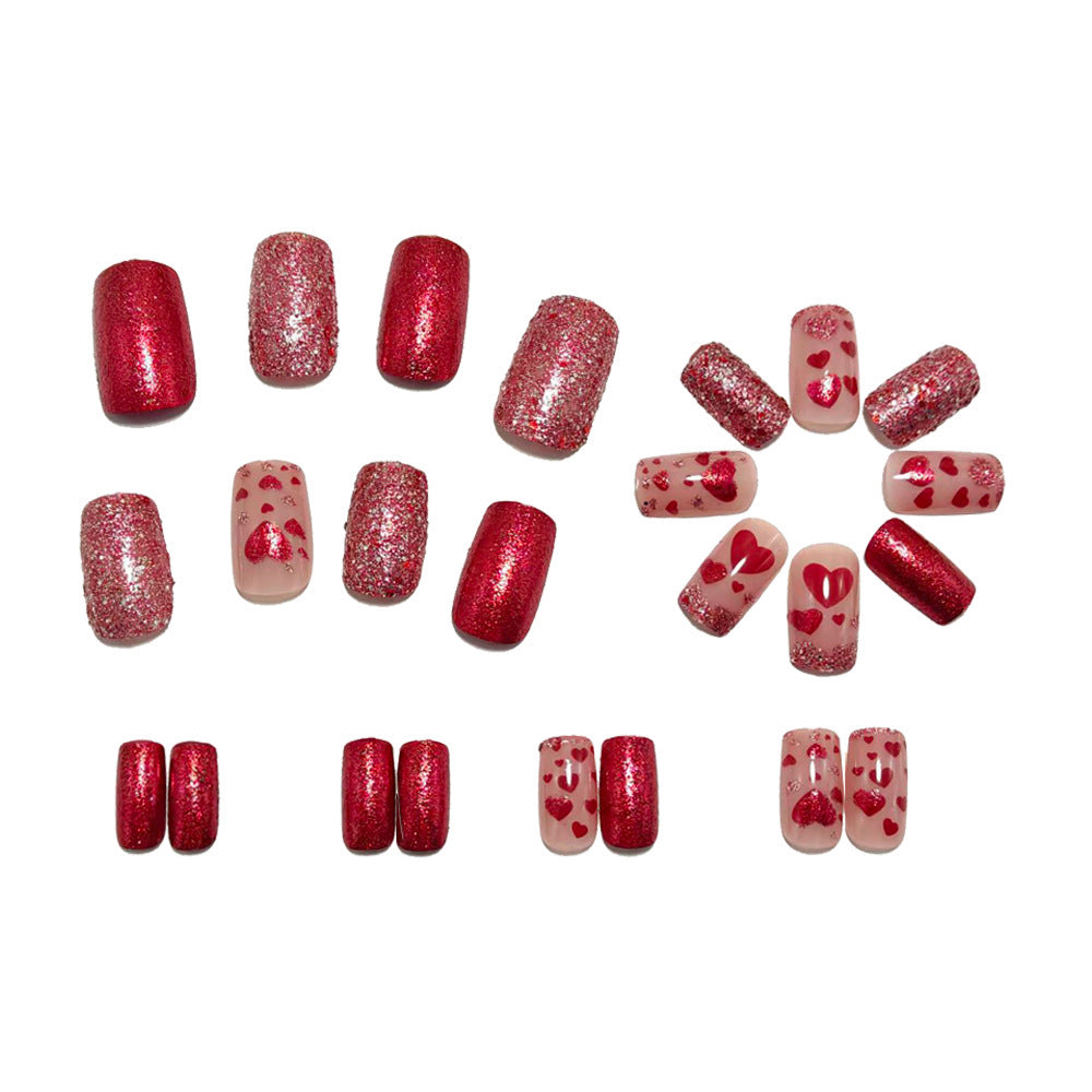 Artificial nails with heart design and glitter Bowlift