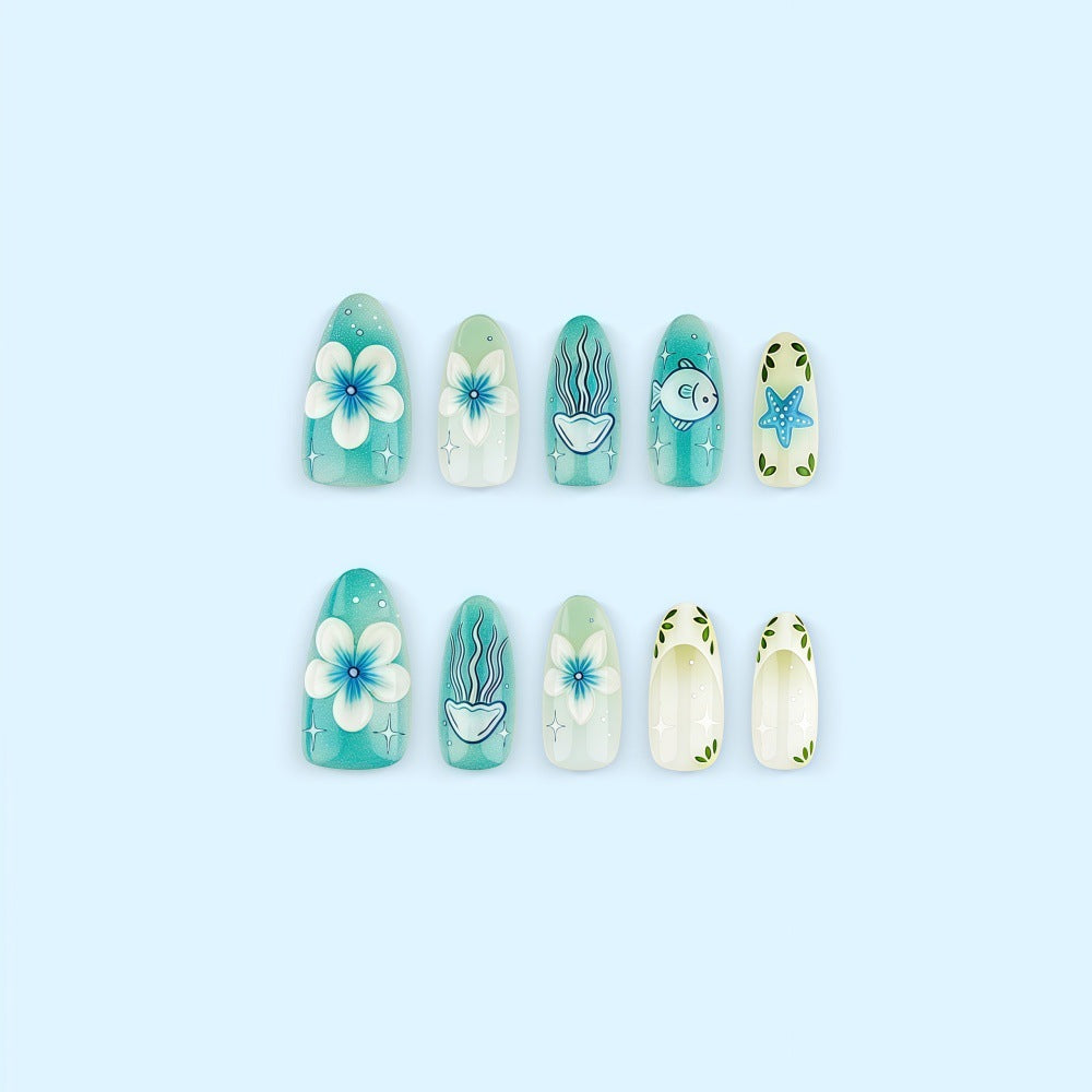 Artificial nails in a maritime design with colorful shell and water motifs Bowlift