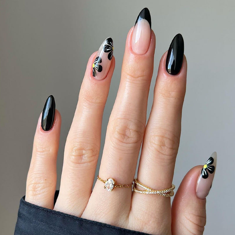 Elegant nail tips with floral accents Bowlift