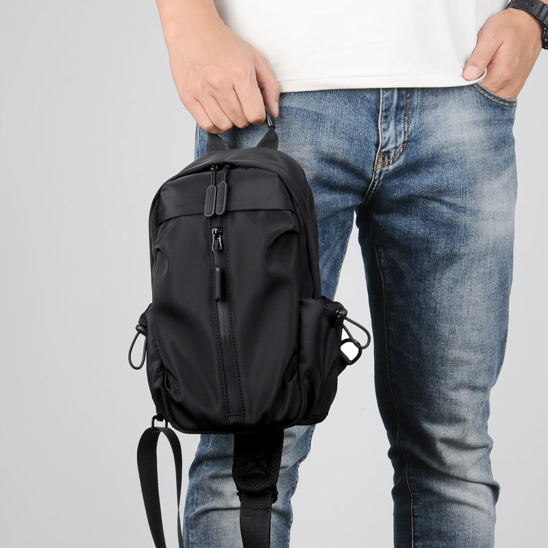 Sling backpack with multiple compartments Bowlift