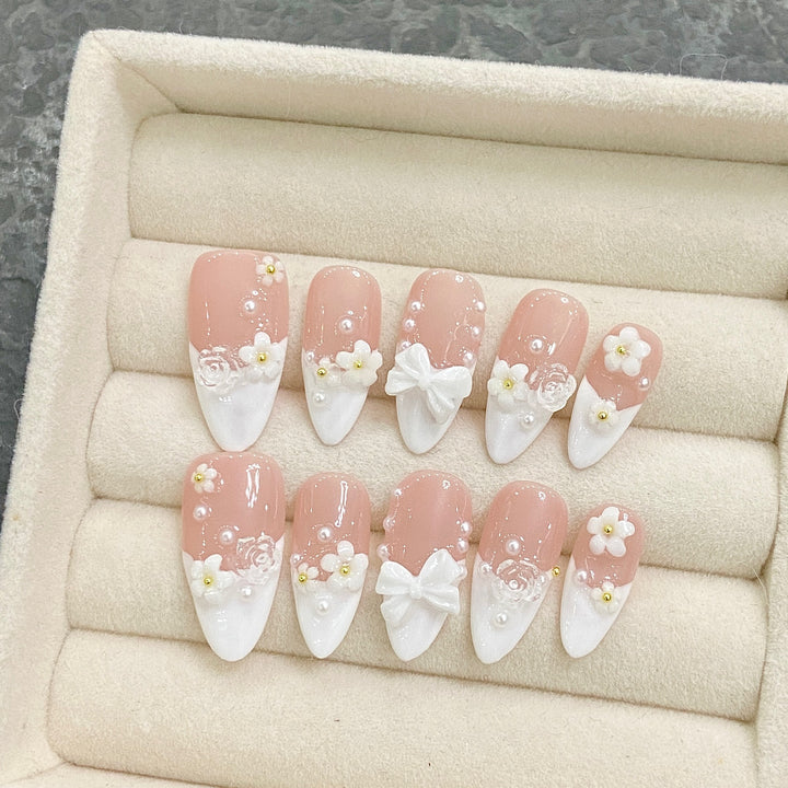 Artificial nail set with floral and glamorous accents Bowlift