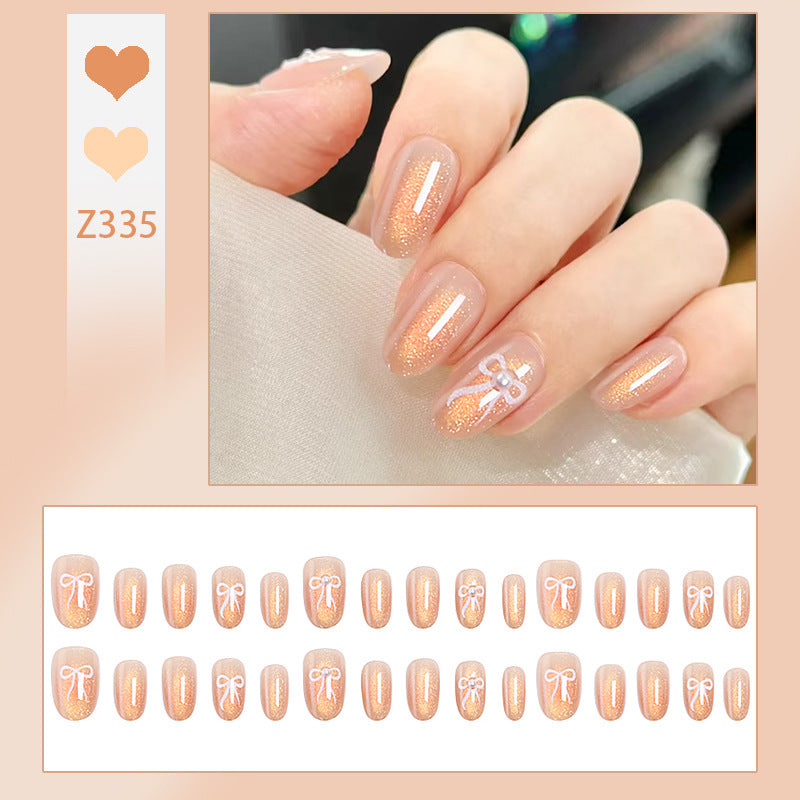 Glamorous artificial nail tips with glitter accents Bowlift
