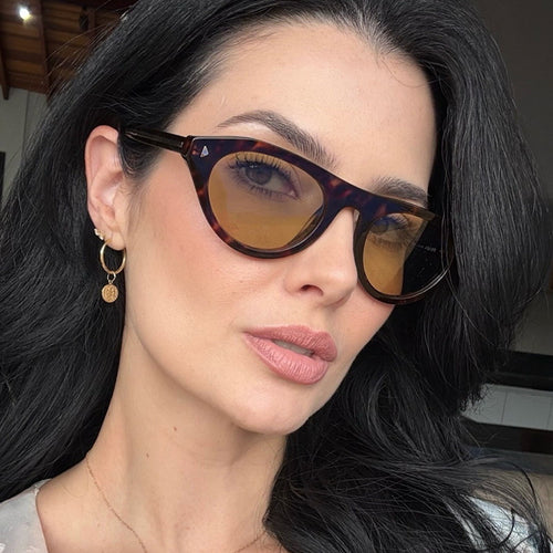 Women's fashionable sunglasses with curved frame and protective UV filter Bowlift