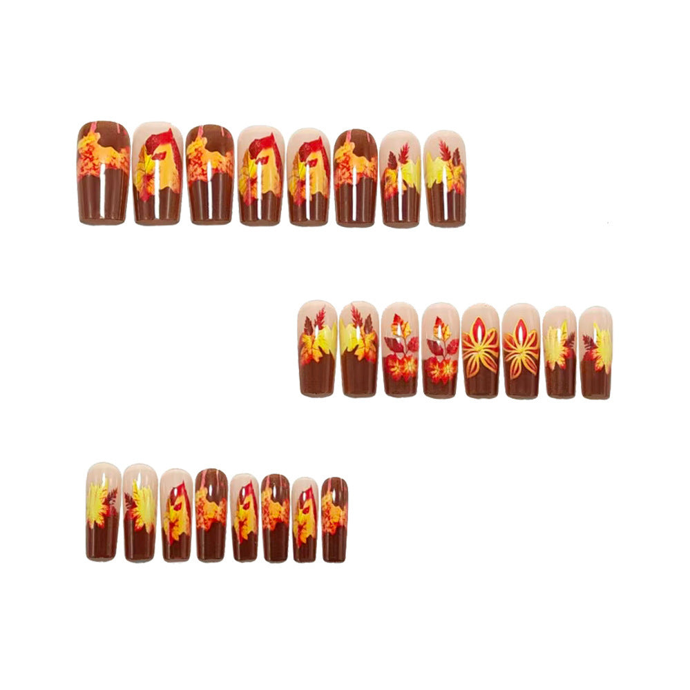 Artificial nails in elegant autumn design with leaf motifs Bowlift