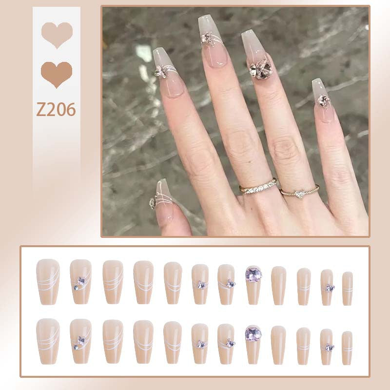 Art nail set with filigree decorations and glamorous accents Bowlift