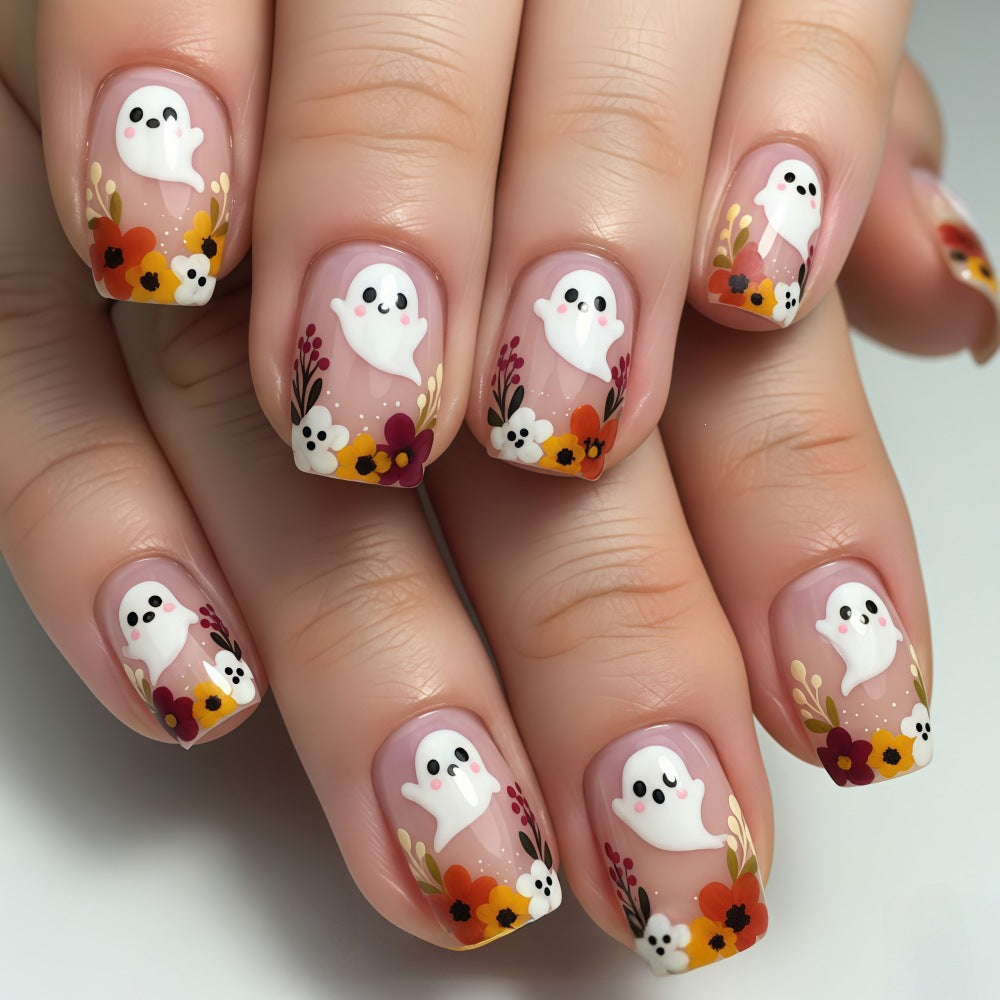 Artificial nails with ghost motif and flower accents Bowlift