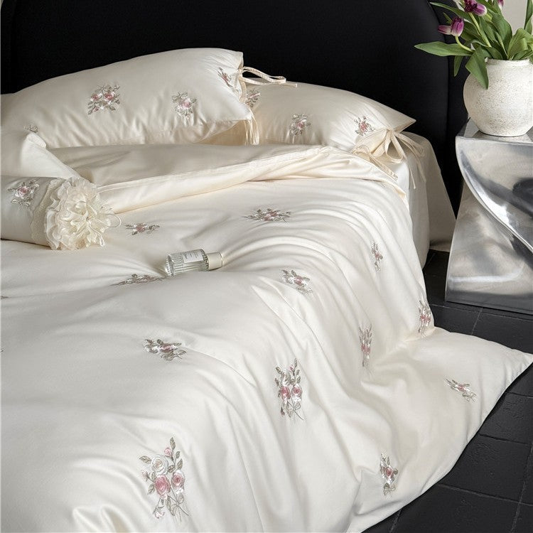 Satin bedding set with floral relief embroidery and velvety shine Bowlift